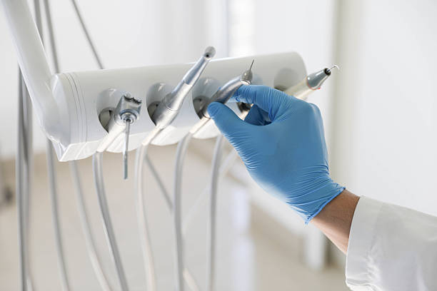 Professional Tooth Extraction technician working in Virginia Beach, VA